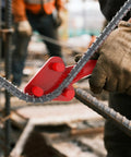 Heavy Duty Reverse Head Rebar Bender For 5/8 Inch Metal Rods in use, bending steel rebar at 90 degrees with red lever design.