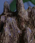 Close-up of Solid Agarwood Feng Shui Decor Piece From Nha Trang With Aged Raw Material And Fragrance Spice, showcasing wood texture.