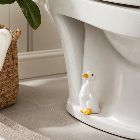 Total Bath Refresh With These Straight Up Cute Ceramic Duck Toilet Bolt Caps Set Of Two Standing Screw Covers Featuring Easy Peasy Setup And Real Deal Rust Protection, displayed on toilet.