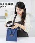 Woman packing 500W Mini Electric Hot Plate For Coffee Nerds Moka Pot Friendly 110V Compact RV Camping Stove into a blue bag
