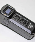 Ultra Compact 1000 Lumen Keychain Flashlight For Everyday Carry With Direct Turbo And Ultralow Modes Five Brightness Levels Rechargeable Built In Battery RGB LED Light Pocket Friendly EDC Torch showing buttons and OLED display