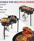 High Pressure Propane Outdoor Cooking Grill Burner For Camping And Backyard BBQs With CSA Regulator 0 To 20 PSIG And 4 Ft Gas Hose Dual Cast Iron Burners in use with various cookware.