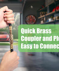 Close-up of hands connecting heavy duty three eighths inch air hose with brass quick coupler and plug in a garage setting
