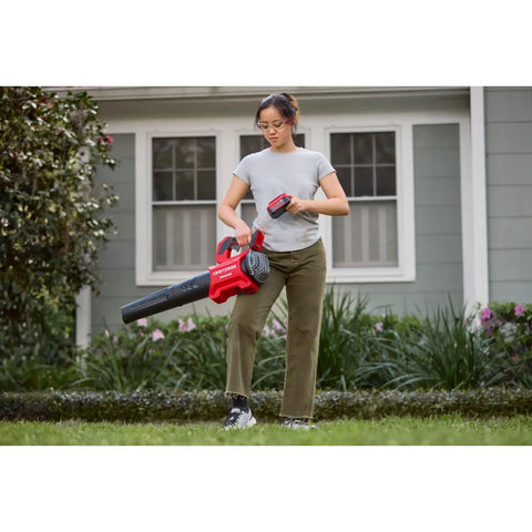 Person using Cordless Leaf Blower With Battery And Charger V20 For Quick Yard Cleanup Up To 110 MPH Air Speed Lightweight Handheld Electric Blower With Brushless Motor 5.0Ah Battery Fast Charge Quiet Operation No Gas in garden