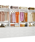 Customizable Four Piece Closet System With Twelve Wooden Drawers And Open Shelves Expands From Eight To Twenty One Feet with dresses and accessories.