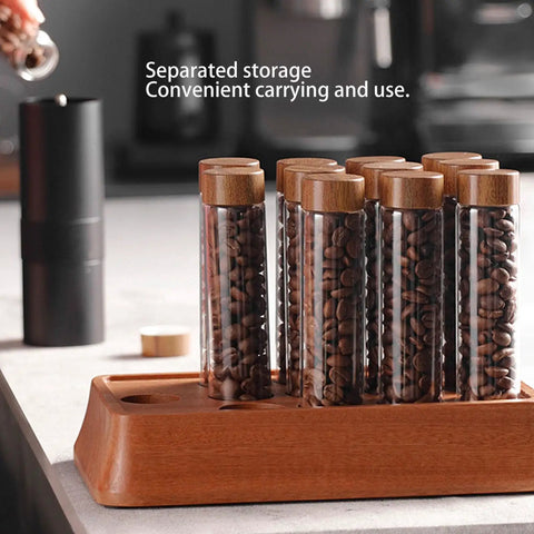 Keep Your Daily Coffee Run Fresh With This Top Tier Airtight Single Dose Bean Cellar Crafted From Genuine Walnut Wood And Clear Glass Tubes Designed To Be Hella Dope On Any Modern Counter While Blocking Out That Stale Funky Taste - walnut wood jar with clear tubes holding coffee beans.