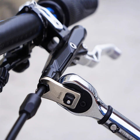Totally Dead Nuts Precise 8mm Cycling Disc Brake Wrench And Cable Adjuster Tool close-up showing hexagon design and adjustable ratchet.