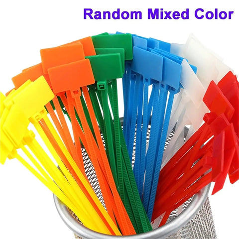 Rock Solid 100 Pack Nylon Self Locking Cable Ties With Write On Labels in assorted colors, organized in a metal holder.