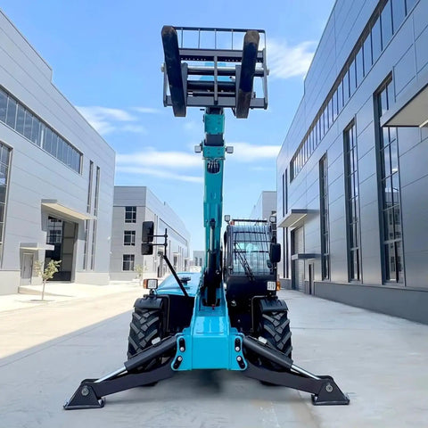 Heavy Duty Telescopic Forklift With Fast Swap Quick Hitch Setup For Effortless Pallet Handling On Rough Ground facing camera in industrial area.