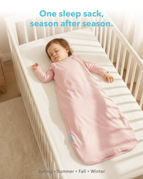 Baby asleep in crib wearing Soft Breathable Viscose Bamboo Sleep Sack For Babies 6 12 18 Months One TOG Wearable Blanket Slate Color
