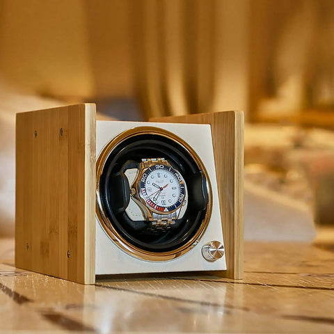 Wooden Dope Watch Winder Box For Automatic Watches, Dual Power Supply Rotating Device, elegantly displayed on a table.