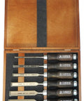 Heavy Duty Bevel Edge Chisel Set Featuring Heat Treated Alloy Steel Blades And Contoured Wooden Grips For Quick Woodworking Carves in a wooden case.