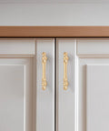 Brushed Gold Cabinet Pulls 30 Pack Center To Center 3 Inch Handles for cupboards and drawers on white cabinet doors