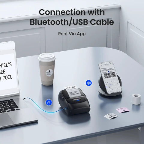 Wireless Bluetooth Thermal Label Printer For Home And Business Prints Two Inch Wide Shipping Labels On Standard Rolls Compact Desktop Maker With Three Included Rolls, Bluetooth and USB connection shown.