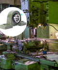 Heavy Hitter Cast Iron Pillow Block Bearing Kit Featuring Dual Bolt Flange Housing And Compact Two Hole Design For Cramped Workspaces And Daily Factory Production Lines on a machine tool.