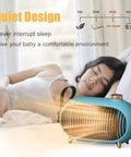 Woman sleeping peacefully with Portable Mini Space Heater For Home And Office, Energy Efficient With Overheat Protection, Three Heat Modes Including 900W High And 400W Medium Plus A Cooling Fan, Retro Style Heater For Bedroom, Camping Tent, RV Trailer, Green nearby.
