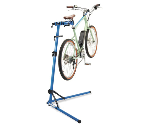 Deluxe Home Mechanic Bike Repair Stand With Pro-Grade Clamp, Easy Setup, Heavy-Duty Steel Frame, 360 Degree Swivel holding bike