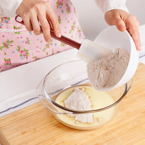 Mixing ingredients with 9.5 inch nonstick silicone spatula from 3 Pack Heat Resistant Silicone Spatulas set in a kitchen bowl
