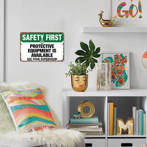 Safety First Aluminum Sign 8x12 Inches Rustproof Wall Decor For Workplace Garage Warehouse Vintage Retro Look See Your Supervisor Protective Gear Is Available mounted on a stylish wall
