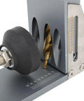 Close-up of No Sweat Precision Pocket Hole Jig System with drill bit, measurement markings, and durable aluminum guide.