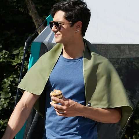 Man outdoors wearing Ultra Compact Microfiber Towel for Travel, Gym, and Camping, Fast Dry, Super Absorbent, Lightweight