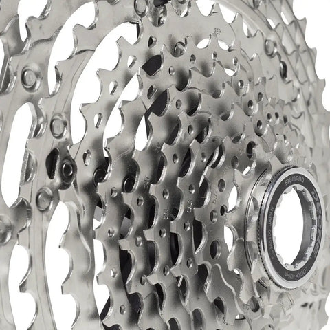 11 Speed Mountain Bike Cassette Sprocket 11 To 42T Deore CS M5100 with steel cogs and aluminum carrier, close-up view