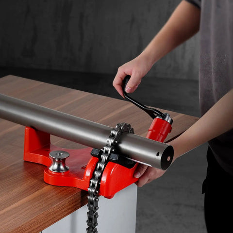 Heavy-Duty Pipe Chain Vise Workhorse with two bending dies clamping a pipe on a bench, showing 34.6-inch chain and cast iron base.