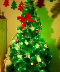 Christmas tree with Green String Lights With 200 LEDs 66 Ft Indoor Outdoor Fairy Lights glowing in living room