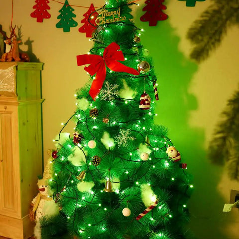 Christmas tree with Green String Lights With 200 LEDs 66 Ft Indoor Outdoor Fairy Lights glowing in living room
