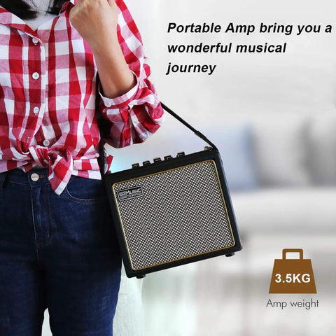 Person holding Portable 30 Watt Acoustic Guitar Amp With Bluetooth Speaker, Rechargeable Battery, 6.5 inch, black, 3.5kg.