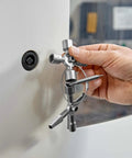 Hand using TwinKey Multifunctional Spanner Kit With Magnetic Eight Arm Two By Four Way Spider Keys on control cabinet