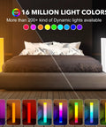2 Pack Corner LED Floor Lamp With App Control RGB Color Changing Lights Music Sync Dimmable Brightness Modern Floor Lamp placed beside a bed with multiple color options displayed.