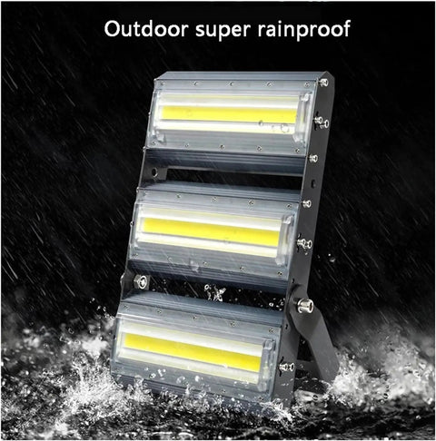 JUDYSSY Led Flood Lights Outdoor, Lens Security Lights Ip67 Waterproof and High, Warm White, 30W showing rainproof design in action.