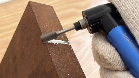 Heavy Duty 95 Degree Right Angle Air Die Grinder Built Different With Precision Gears And Fast Spinning Power used on rusted metal surface.