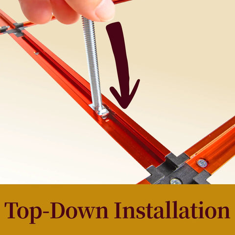 Hand installing 1/4-20 thread bolt into T-track, part of Drop-In T-Slot Bolts Hardware Kit With 60 Pieces, Knobs And Washers.