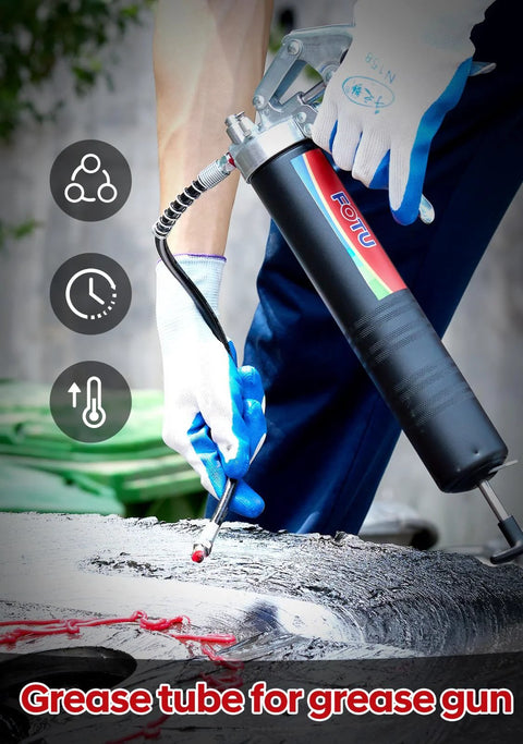 FOTU grease gun with red grease tube in use, gloved hands handling the nozzle.