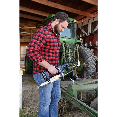 Person using Lincoln 1134 Pistol Grip Grease Gun Kit With 18 Inch Hose And 6 Inch Rigid Extension 5900 PowerLock Lever Action Coupler