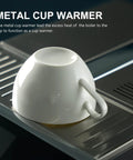 Metal cup warmer for espresso machine, designed to warm cups using excess boiler heat, featuring a sleek white ceramic cup.