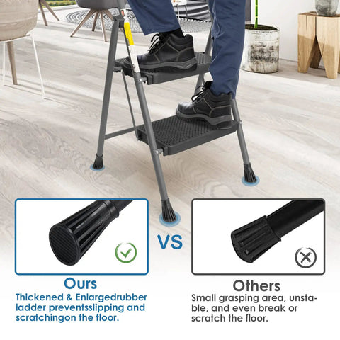 Two Step Folding Ladder With Wide Anti Slip Pedals And Comfort Handle Lightweight Steel Heavy Duty 500 Pound Capacity Portable Multi Use Stool, showing rubber feet on wooden floor.