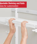Hands adjusting white wire shelf of Custom Closet Kit With Adjustable Metal Wire Shelving Expands From 2 To 4 Feet White Finish Includes Hardware