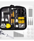 Badass Professional Grade 8 Piece Watch Repair Toolkit with yellow handle tools, stainless steel components, and case opener.