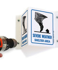 Severe Weather Shelter Area Projecting Sign 5 By 6 Inch Acrylic Outdoor Heavy Duty Direct Printed Safety Sign being installed
