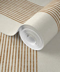 Level Up Your Space With Cream Modern Gold Matte Linen Wallpaper Game Changer PVC Free Durable Wall Covering Pro Grade Paste To Paper Design For Living Areas, rolled wallpaper with subtle beige linen texture and brown stripes.