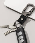 Heavy Duty Key Chain With Bottle Opener, Tough Car Keychain Set featuring metal snap hook carabiner clip, dual key rings, black finish.