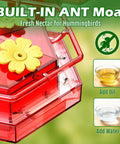 Close-up of Two Pack Window Hummingbird Feeder With Super Sturdy Suction Cups And Built In Ant Moat Easy To Clean And Refill Eight Point Eight Ounce Capacity Outdoor Red Feeders For Quick Bird Watching with built-in ant moat and flower design.