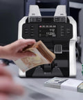 Turbocharged Money Counter Machine With Mixed Denomination Sorting And Reject Pocket, Counterfeit Detection, Multi Currency Sorter in use
