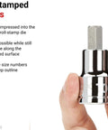 Half Inch Drive Hex Bit Socket Set With Case, 24-Piece Kit showing large stamped markings on socket, held by hand