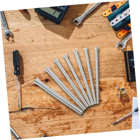 Durable 10 Piece Spring Tubing Bender Set For Plumbing And Electrical Projects on a wooden work table.