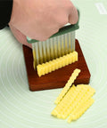COLGRE vegetable chopper with green plastic handle and stainless steel crinkle blade; 2-piece front view