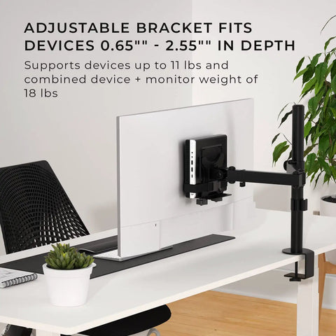 Thin Client Mount Bracket For Under Desk And VESA Arm Setups with white monitor on desk, supports devices 0.65-2.55 inches deep